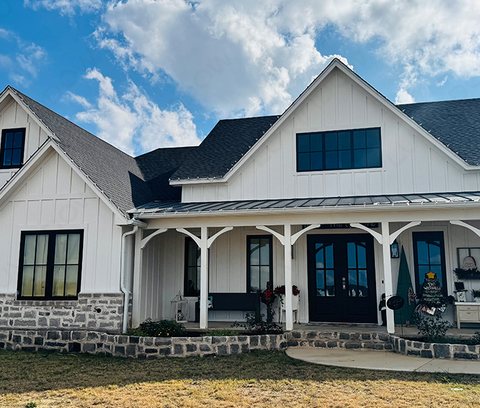 Farmhouse elevation with black aluminium windows