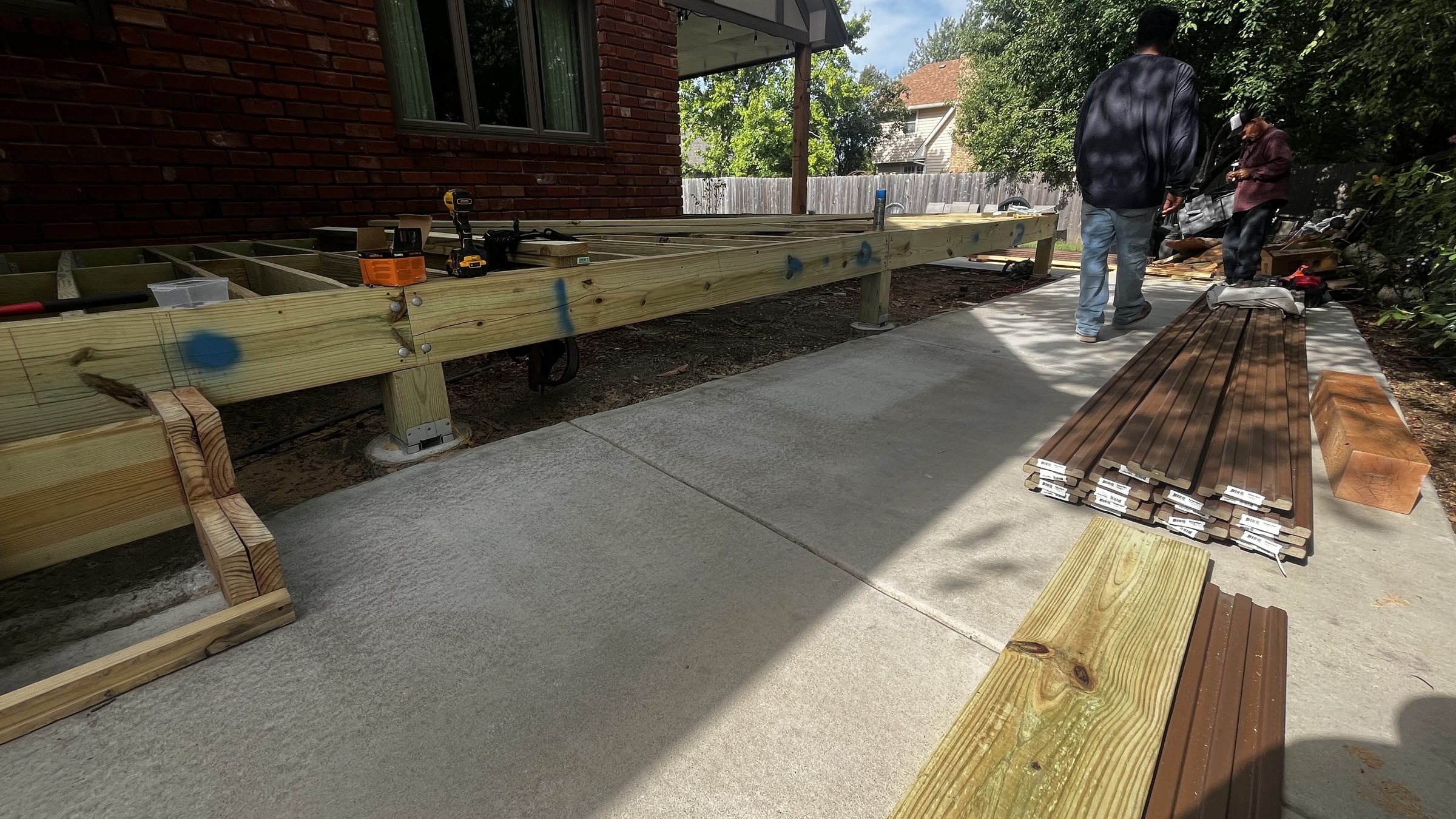 Deck framing underway with crew on site