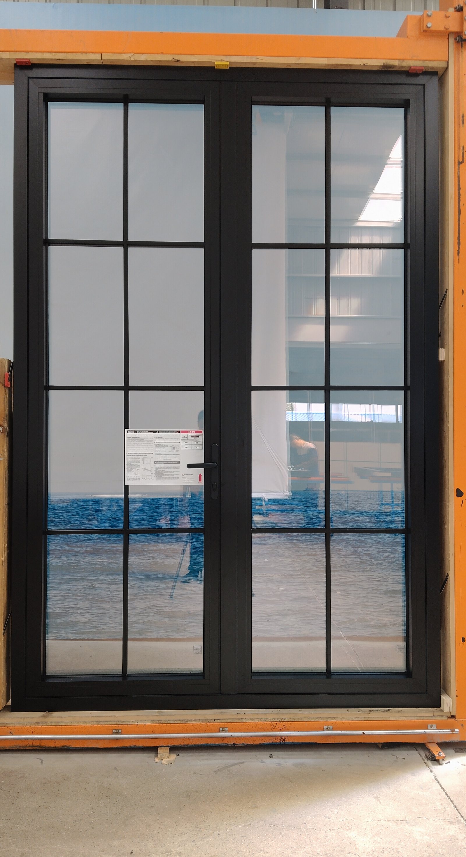 Aluminium French doors with colonial grilles