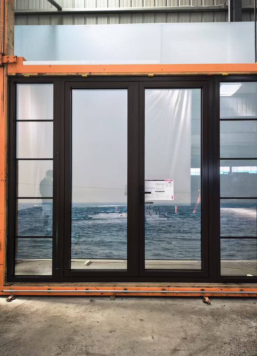 Multi-panel aluminium glass door with grilles
