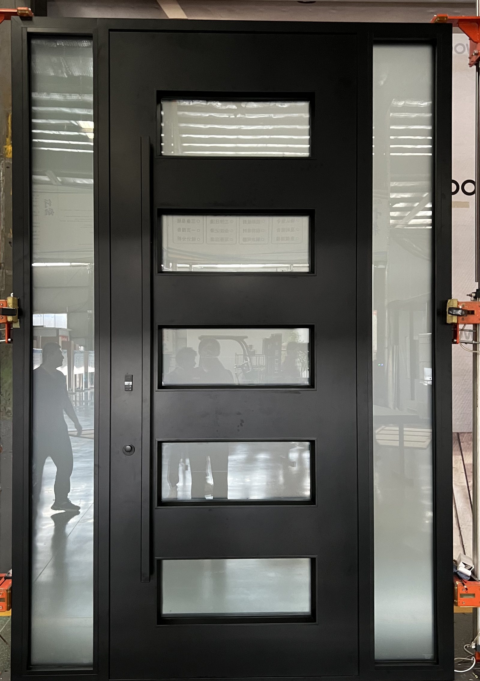 Black aluminium entry door with two sidelites and horizontal glass lites