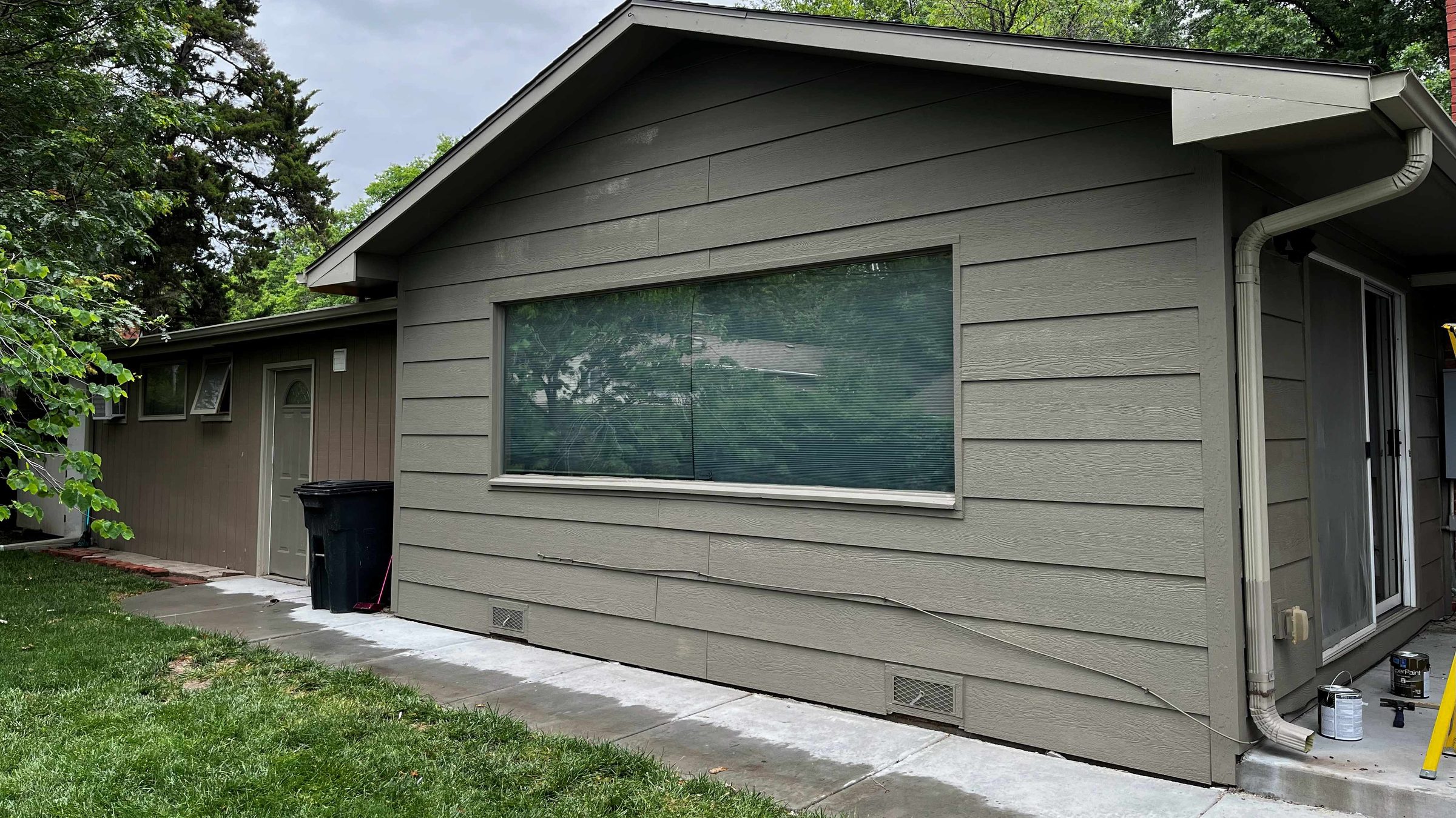 Residential lap siding and gutters
